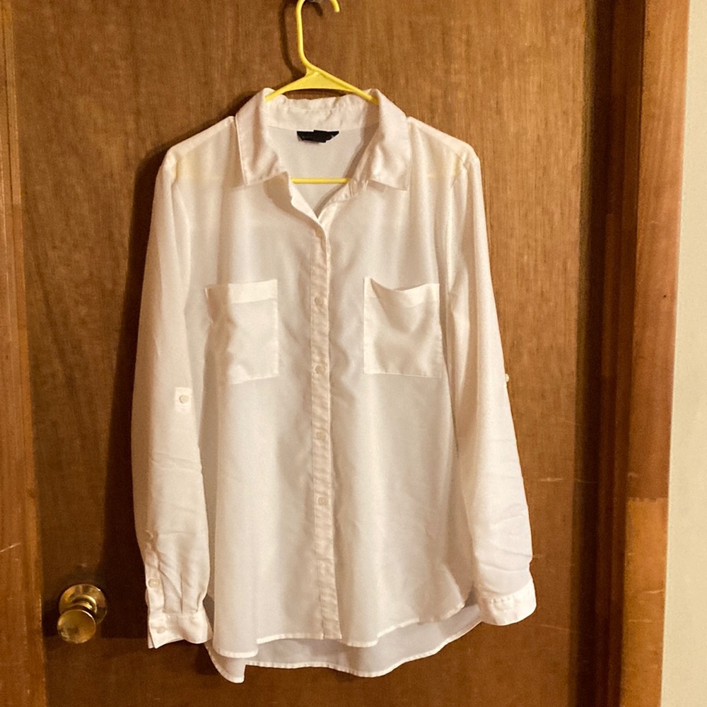 Med-cream color-soft flowing-sleeves roll up with holder attached.